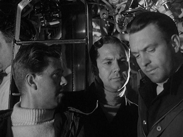 Кадр из фильма Волны над нами / Above Us the Waves (1955)