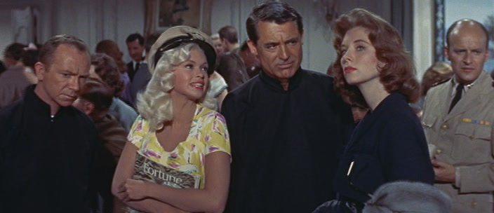 Кадр из фильма Поцелуй их за меня / Kiss Them for Me (1957)