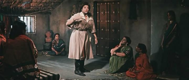 Кадр из фильма Хождение за три моря / Pardesi (1958)