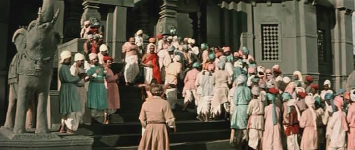 Кадр из фильма Хождение за три моря / Pardesi (1958)