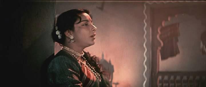 Кадр из фильма Хождение за три моря / Pardesi (1958)