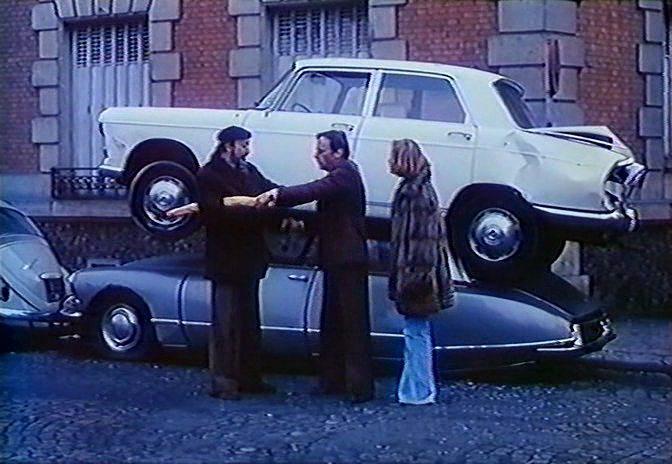Кадр из фильма Компьютер для похорон / L'ordinateur des pompes funèbres (1976)