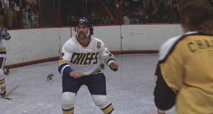 Кадр из фильма Удар по воротам / Slap Shot (1977)