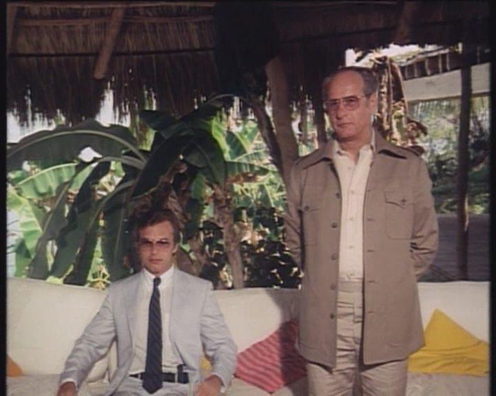 Кадр из фильма Принцип Домино / The Domino Principle (1977)