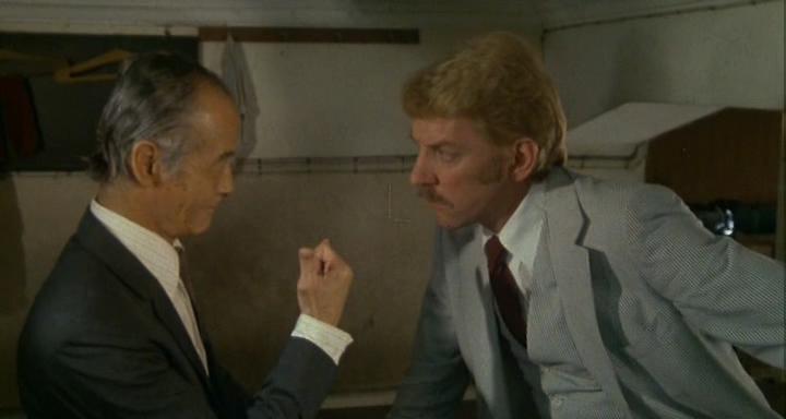 Кадр из фильма Мужчина, женщина и банк / A Man, a Woman and a Bank (1979)