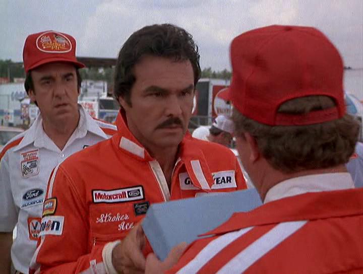 Кадр из фильма Гонщик Строкер / Stroker Ace (1983)