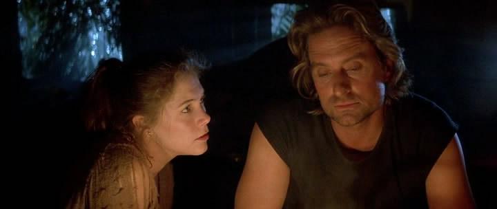 Кадр из фильма Роман с камнем / Romancing the Stone (1984)