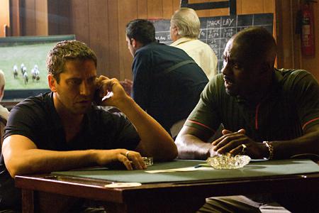 Кадр из фильма Рок-н-рольщик / RocknRolla (2009)