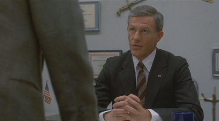 Кадр из фильма Полицейский / Cop (1988)