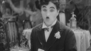 Кадры из фильма Огни большого города / City Lights (1931)