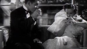 Кадры из фильма Цепи / Chained (1934)