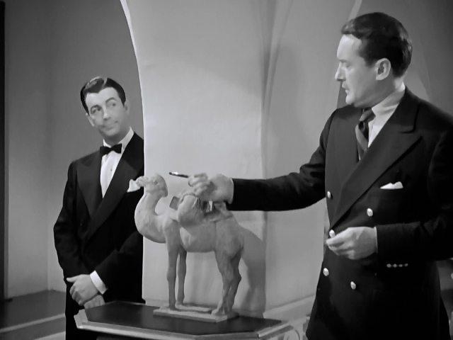 Кадр из фильма Ее картонный любовник / Her Cardboard Lover (1942)