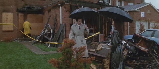 Кадр из фильма Страховой агент / The Adjuster (1991)
