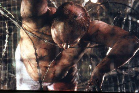 Кадр из фильма Пила: игра на выживание / Saw (2004)