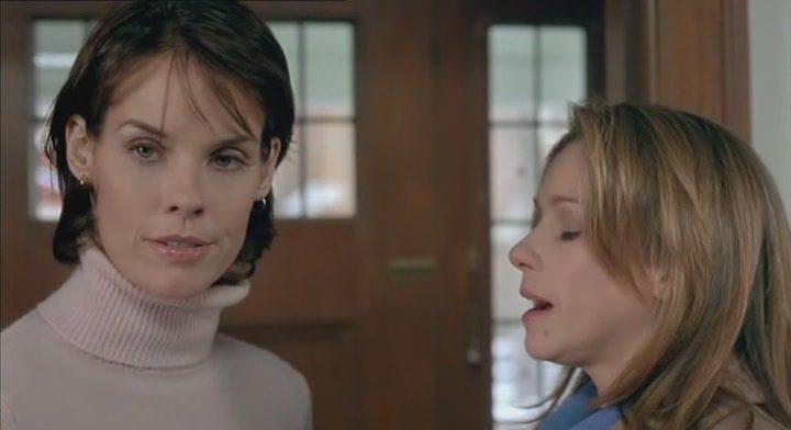 Кадр из фильма Охота на женщину / A Woman Hunted (2003)