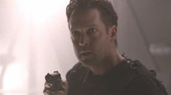 Кадр из фильма Жестокое царство / Harsh Realm (1999)